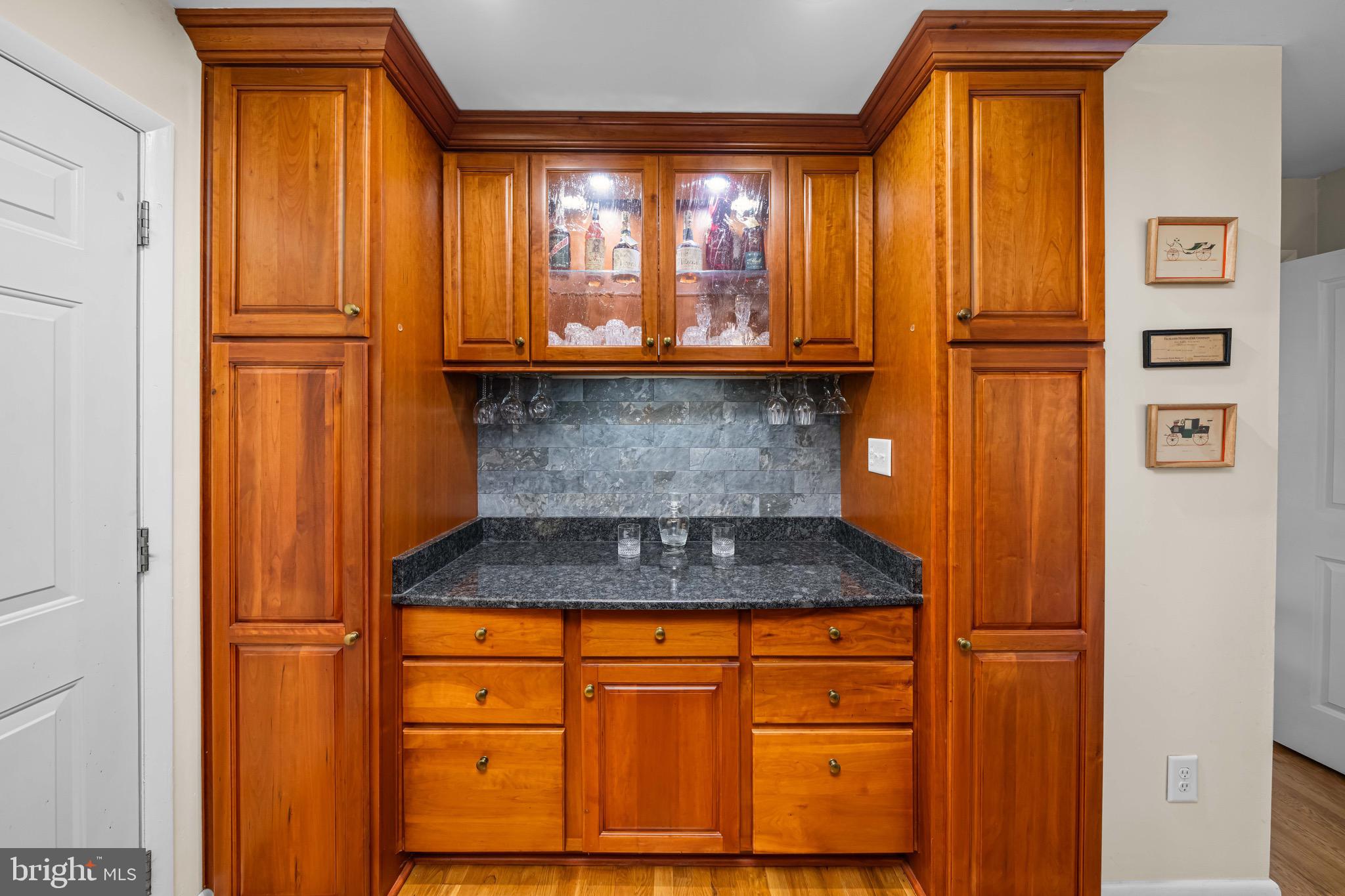 2528 Raven Road Wilmington, DE 19810 - Photo 17 of 39 Family Room with Custom Cabinetry and Bar