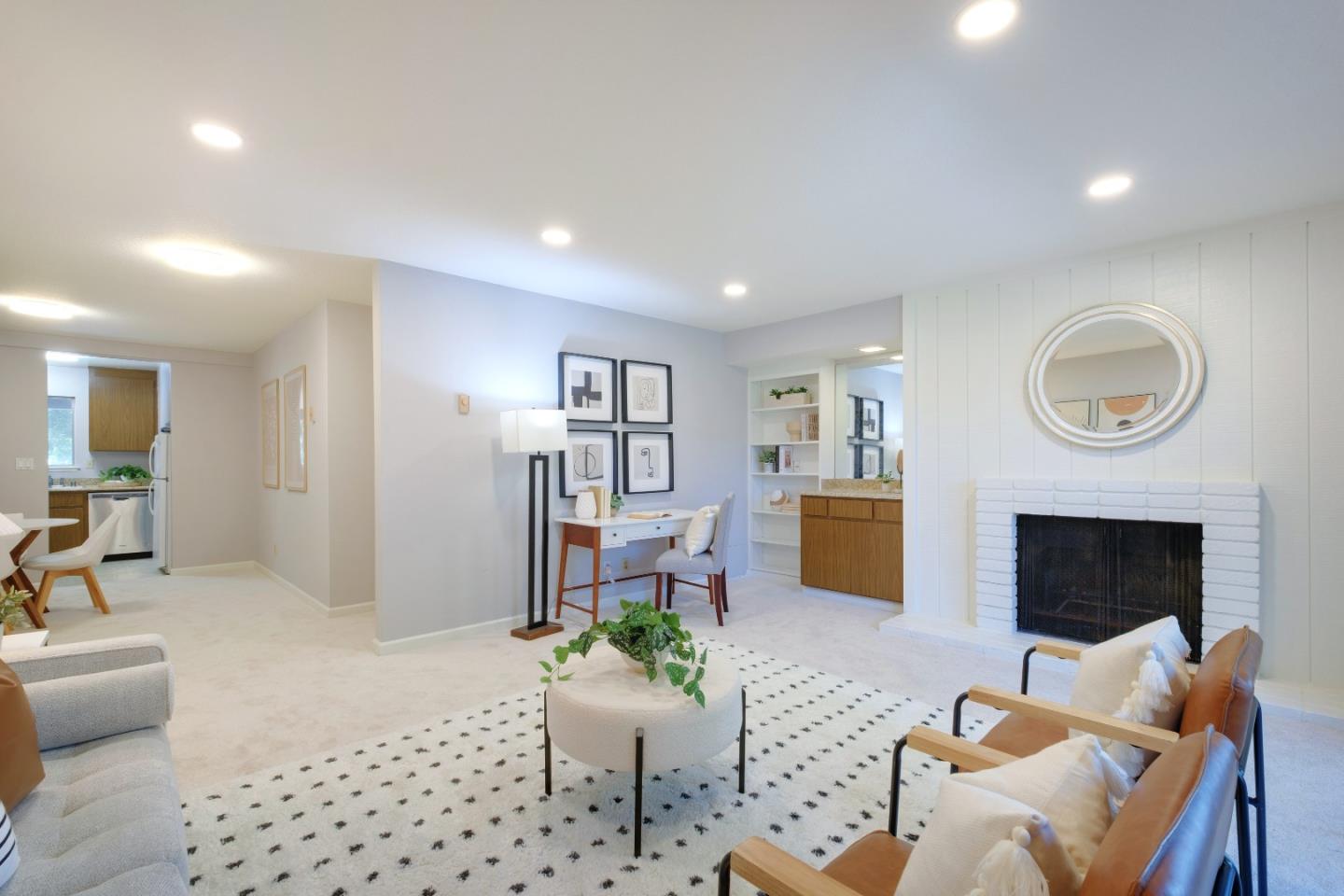 50 East Middlefield Road, Unit 40 Mountain View, CA 94043 - Photo 12 of 41 a living room with furniture and a fireplace