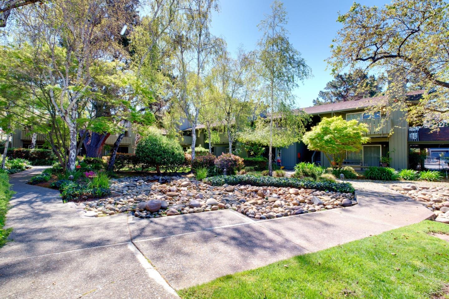 50 East Middlefield Road, Unit 40 Mountain View, CA 94043 - Photo 6 of 41 a view of a garden with a patio