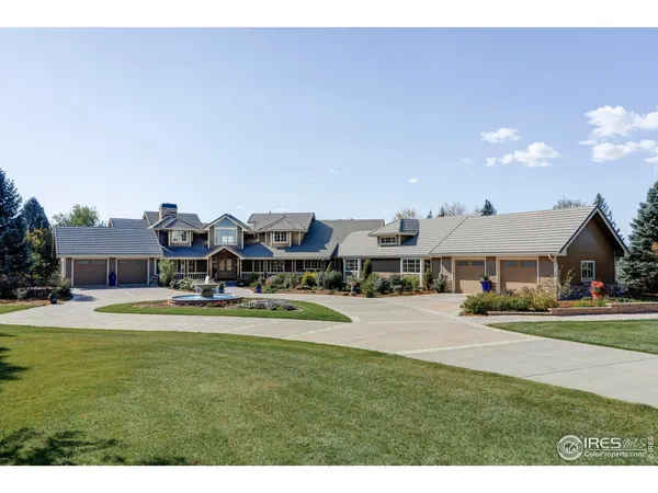 a view of a house with swimming pool yard and patio