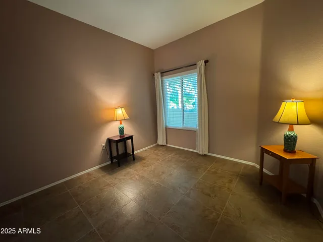 a room with furniture and a window