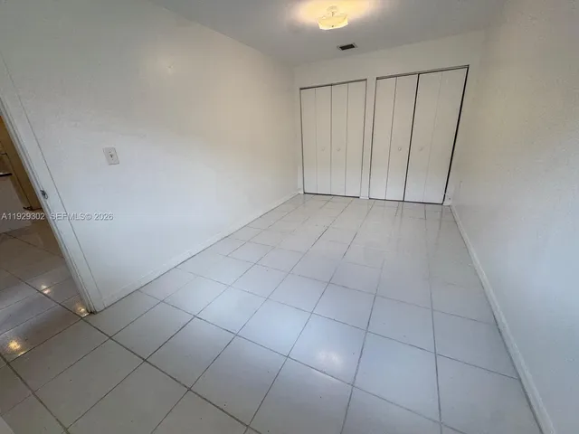 a bathroom with a toilet a sink and bathtub