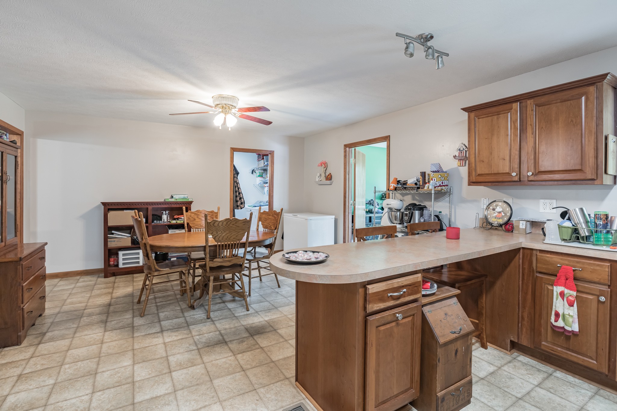 420 Sands Road Pulaski, TN 38478 - Photo 14 of 36 a room with a dining table chairs and view kitchen