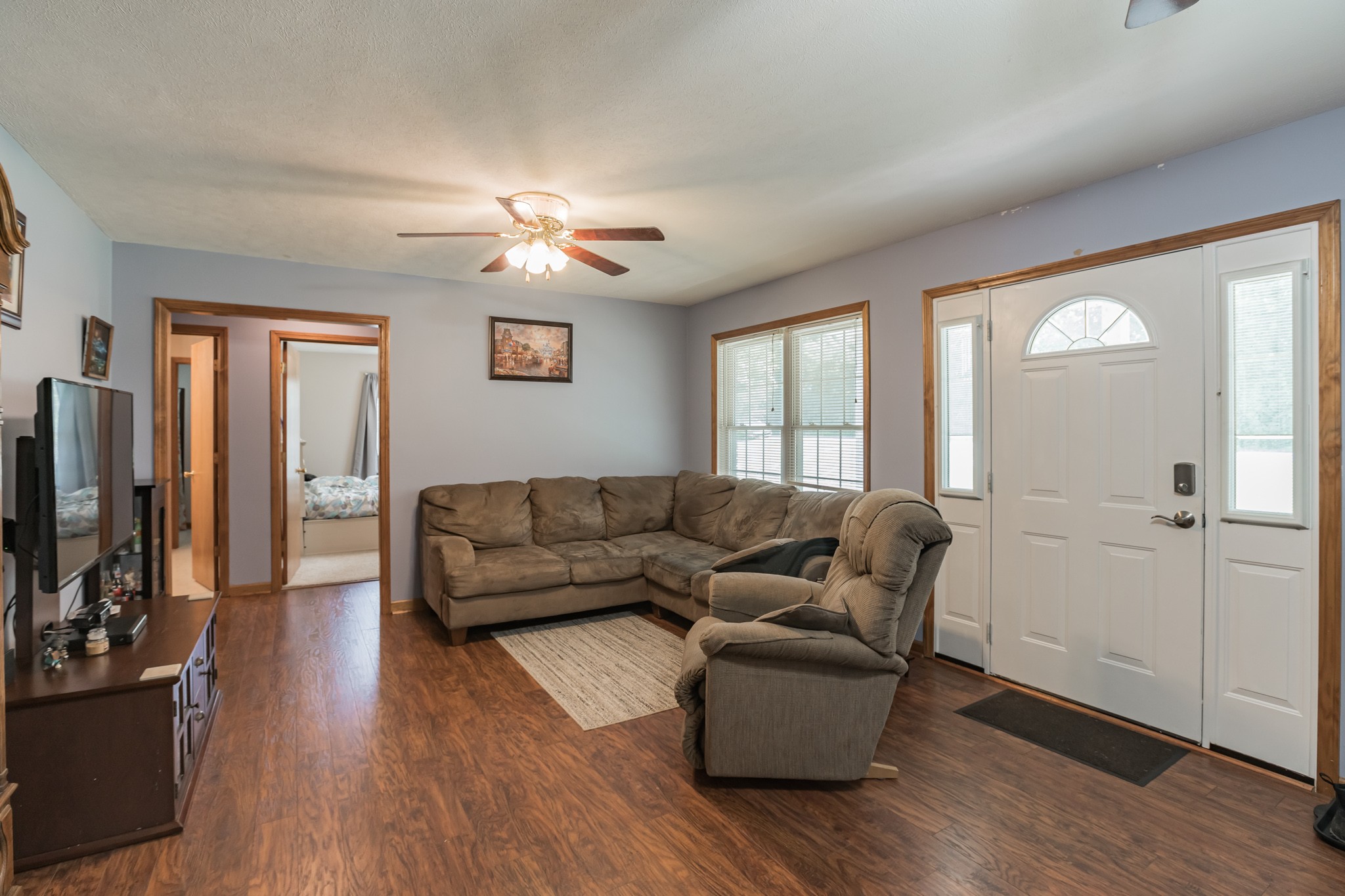 420 Sands Road Pulaski, TN 38478 - Photo 16 of 36 a living room with furniture and a flat screen tv