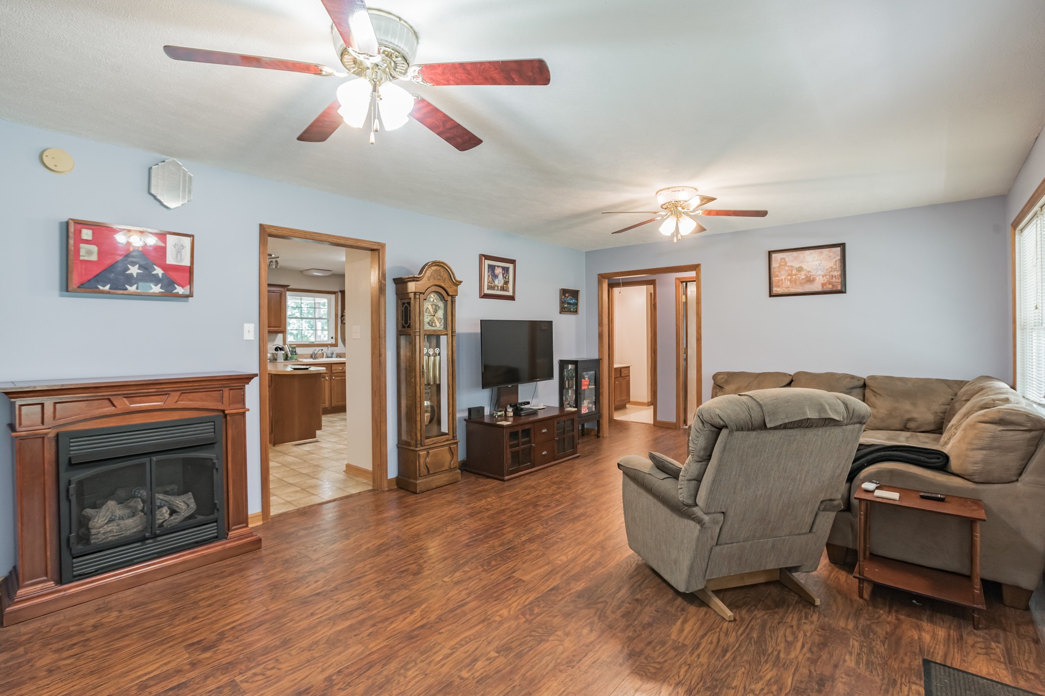 420 Sands Road Pulaski, TN 38478 - Photo 18 of 36 a living room with furniture and a fireplace