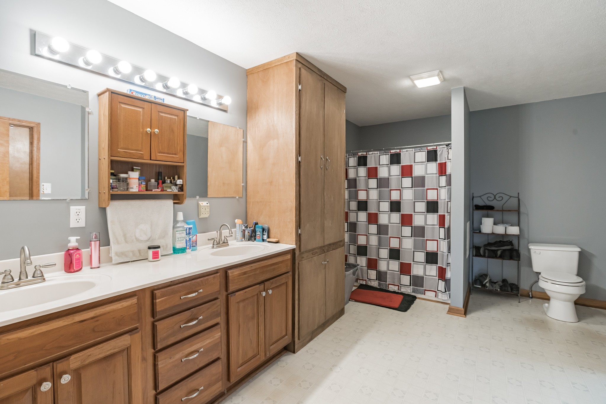 420 Sands Road Pulaski, TN 38478 - Photo 21 of 36 a bathroom with a double vanity sink mirror and double