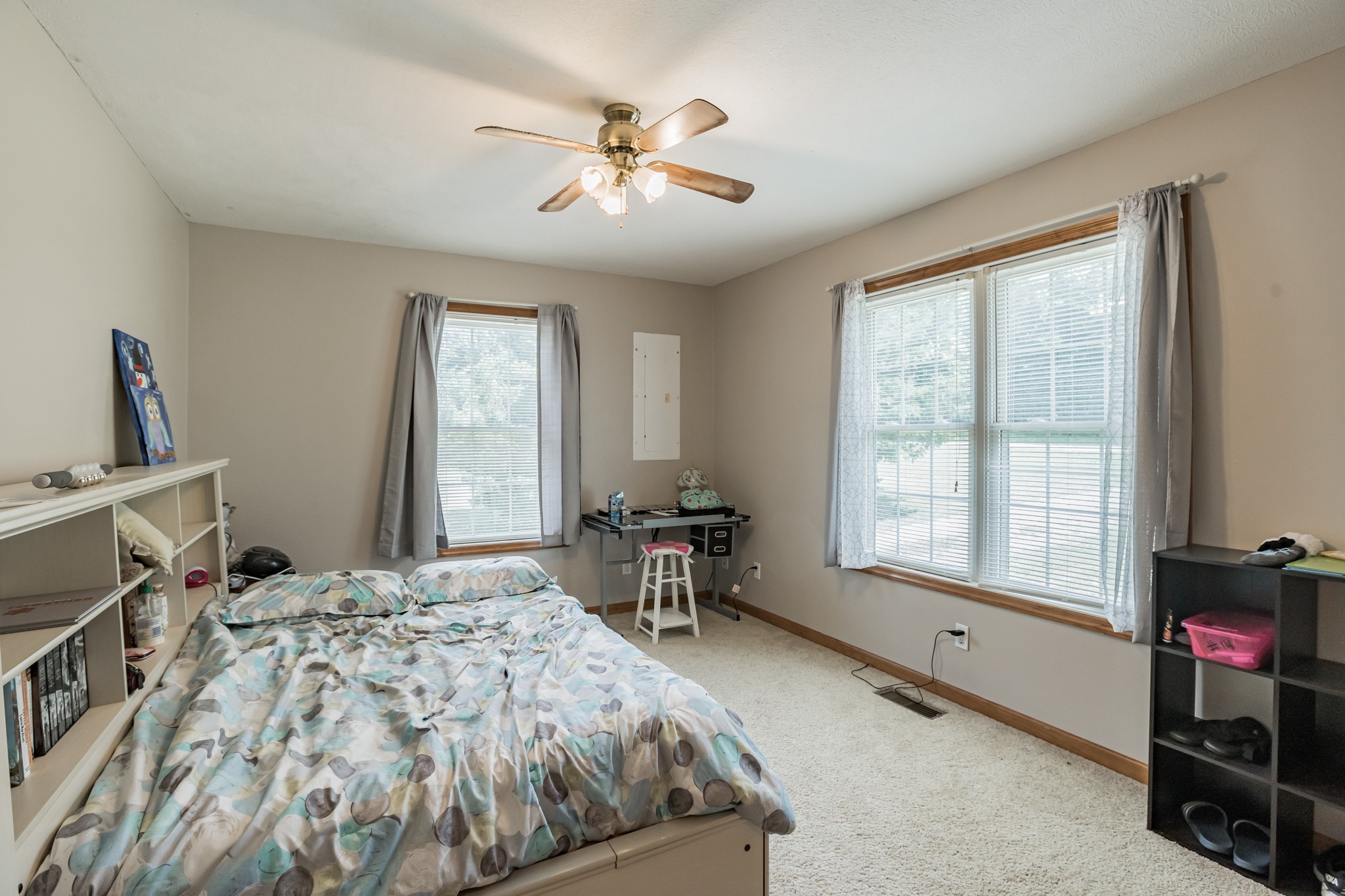 420 Sands Road Pulaski, TN 38478 - Photo 23 of 36 a spacious bedroom with a bed and a table in it