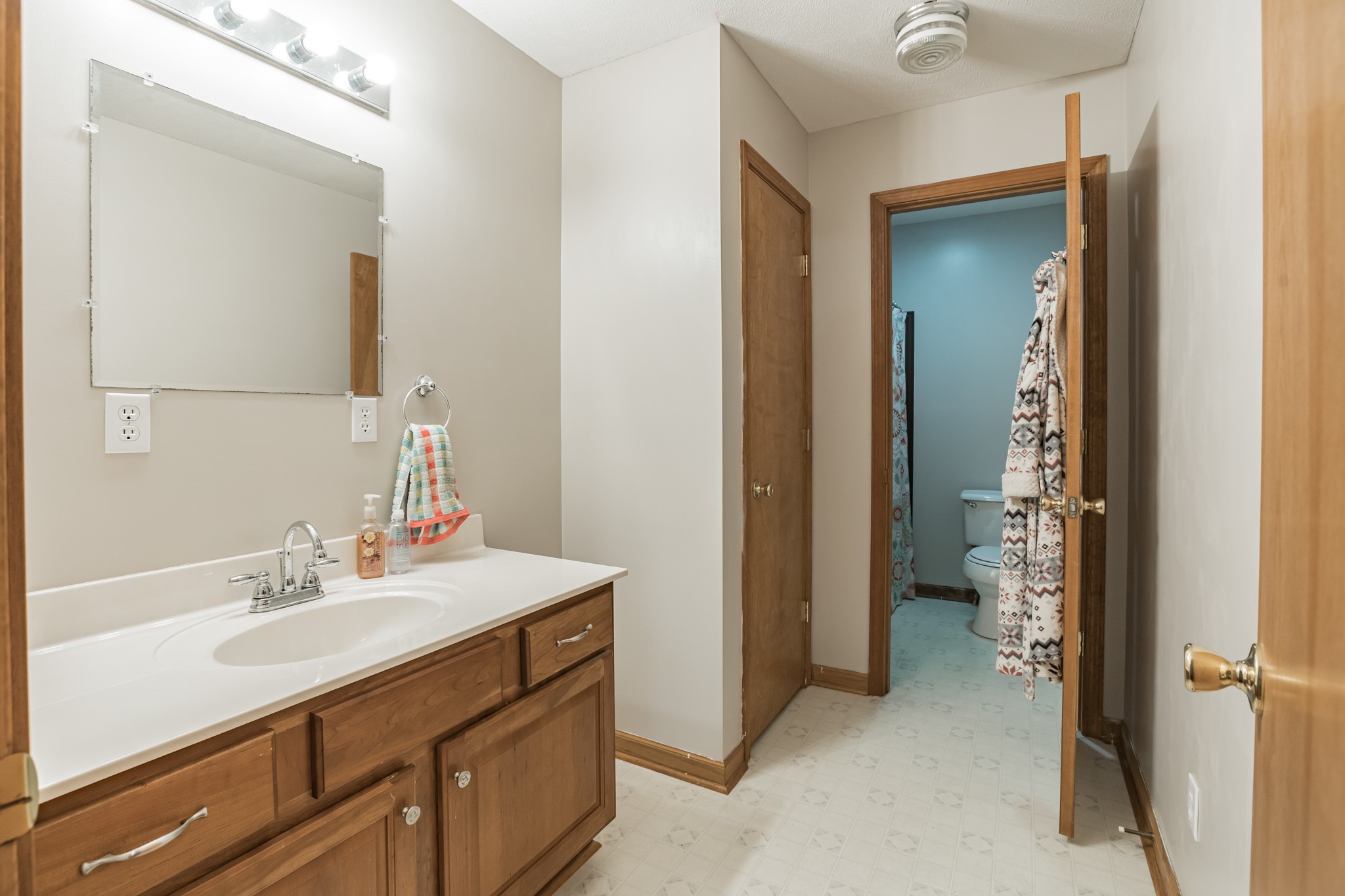 420 Sands Road Pulaski, TN 38478 - Photo 27 of 36 a bathroom with a sink and a mirror
