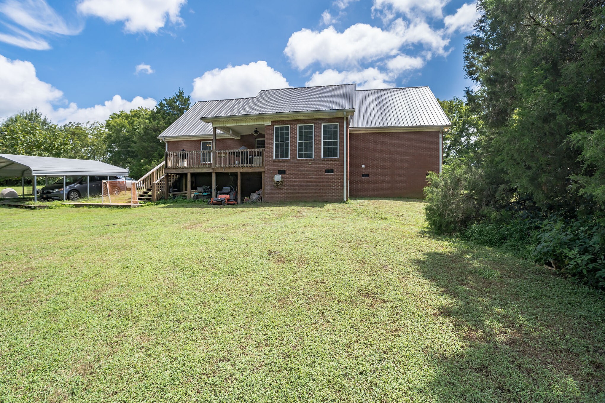 420 Sands Road Pulaski, TN 38478 - Photo 7 of 36 a view of a house with a yard and sitting area