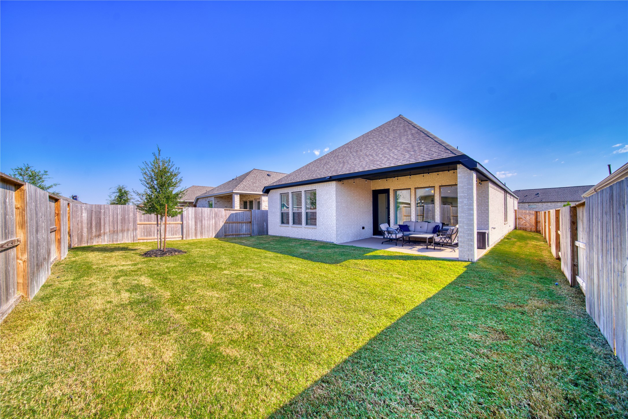 9018 Moose Trail Manvel, TX 77578 - Photo 29 of 37 a view of a house with swimming pool and a yard
