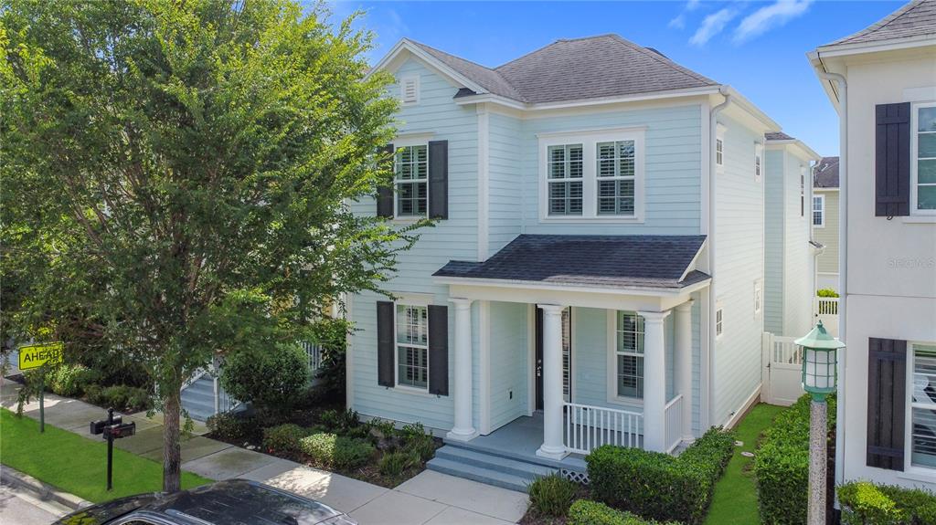 1513 Resolute Street Celebration, FL 34747 - Photo 1 of 43 a front view of a house with a yard