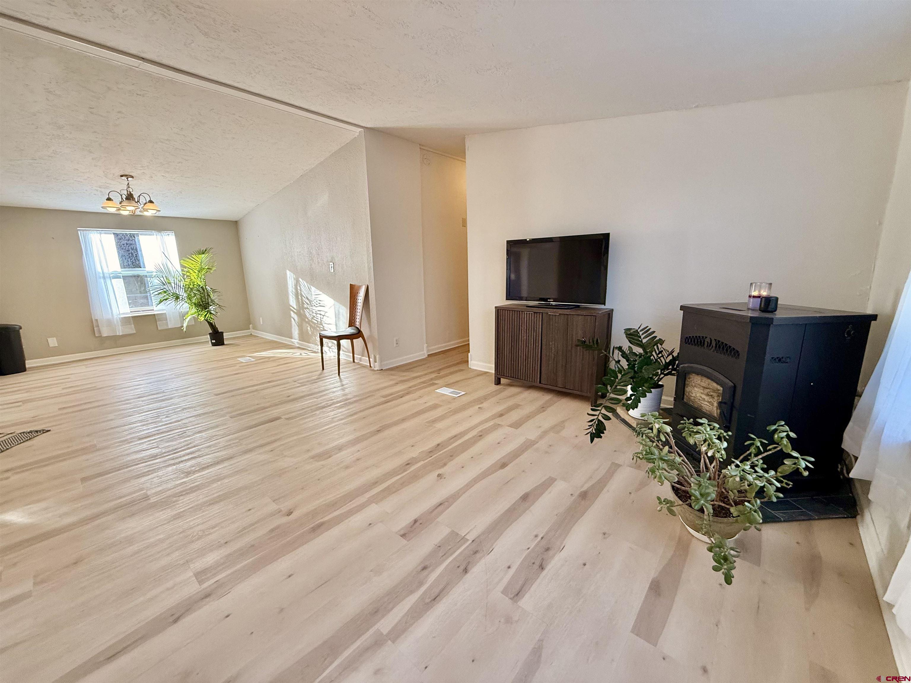 281 Alpine Drive Durango, CO 81301 - Photo 24 of 42 a room with furniture and a flat screen tv