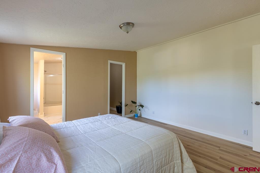 281 Alpine Drive Durango, CO 81301 - Photo 29 of 42 a bedroom with a bed and a window