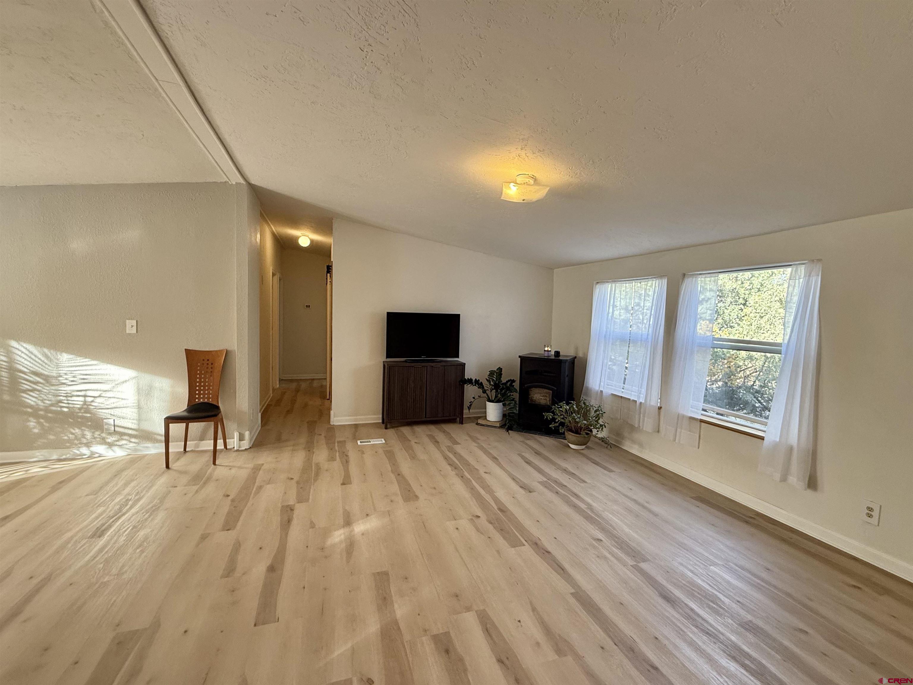 281 Alpine Drive Durango, CO 81301 - Photo 32 of 42 a view of livingroom with furniture and a flat screen tv