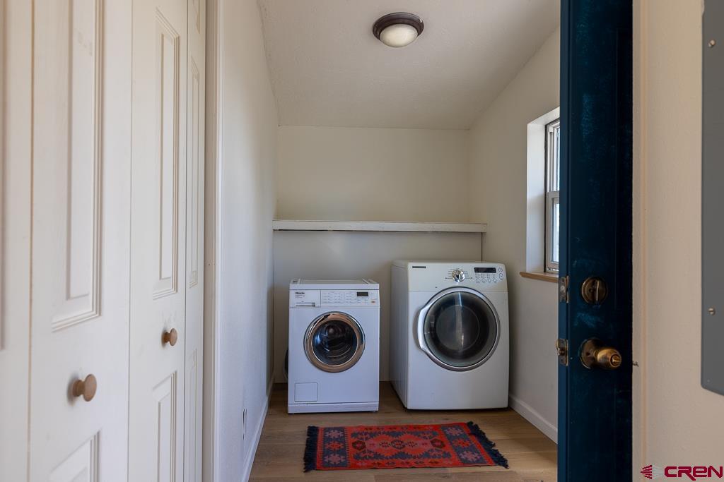 281 Alpine Drive Durango, CO 81301 - Photo 38 of 42 a utility room with dryer and washer