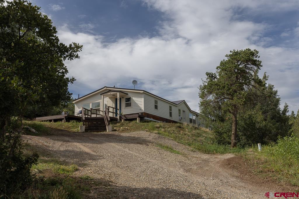 281 Alpine Drive Durango, CO 81301 - Photo 41 of 42 a view of a house with a yard