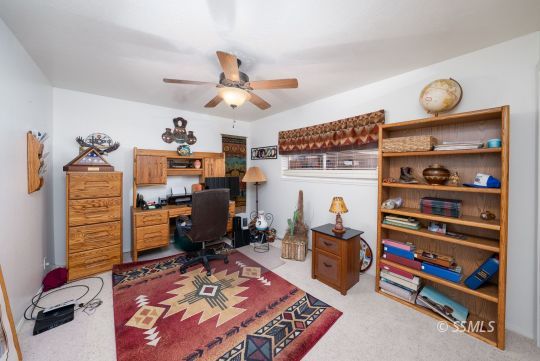 820 West Ward Avenue Ridgecrest, CA 93555 - Photo 13 of 26 a room with furniture and storage area