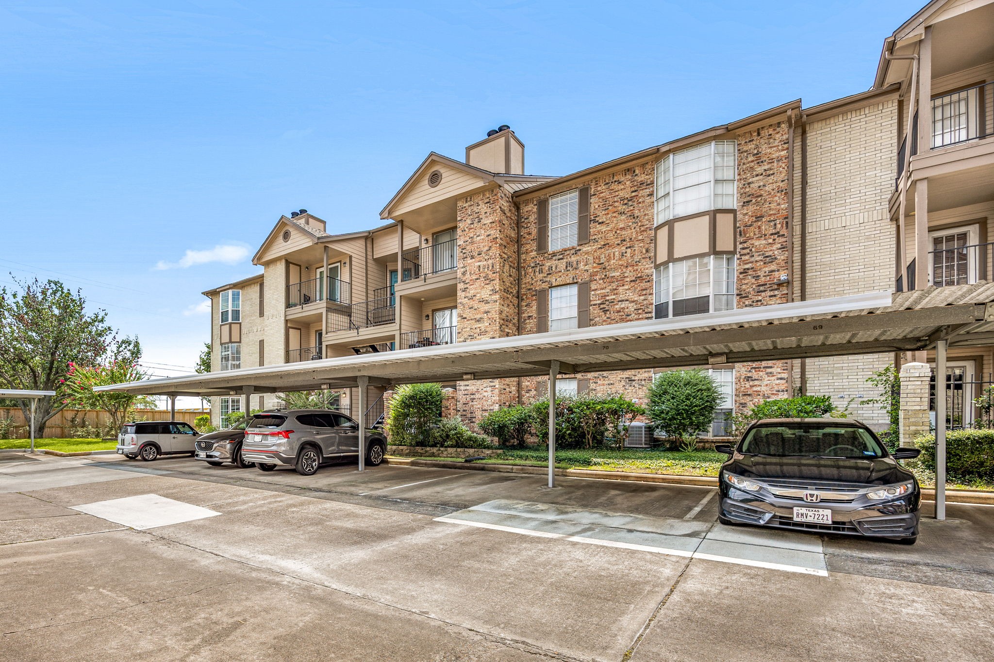 2121 Hepburn Street, Unit 710 Houston, TX 77054 - Photo 25 of 35 a car parked on the side of a street