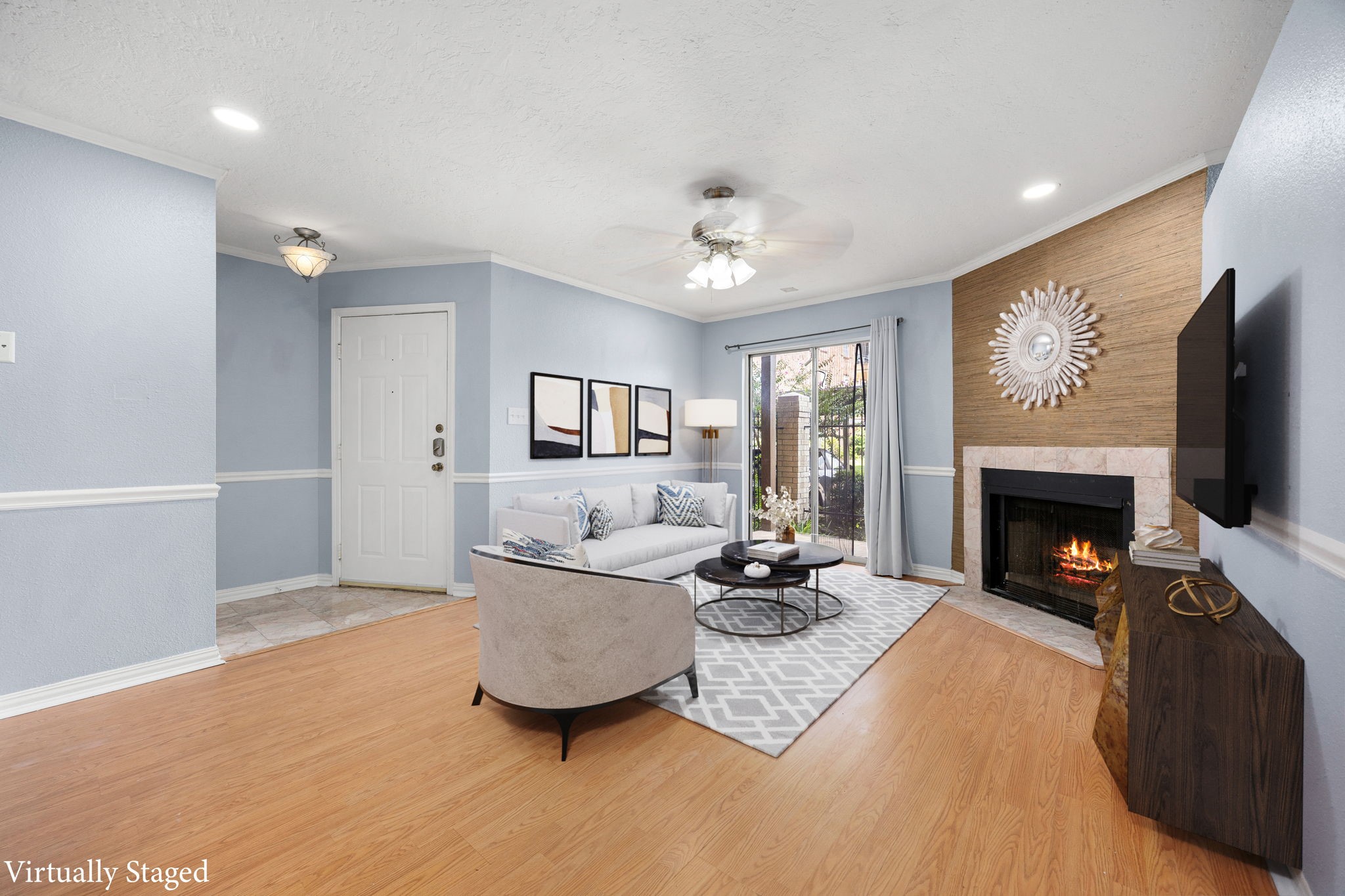 2121 Hepburn Street, Unit 710 Houston, TX 77054 - Photo 10 of 35 a living room with furniture and a fireplace