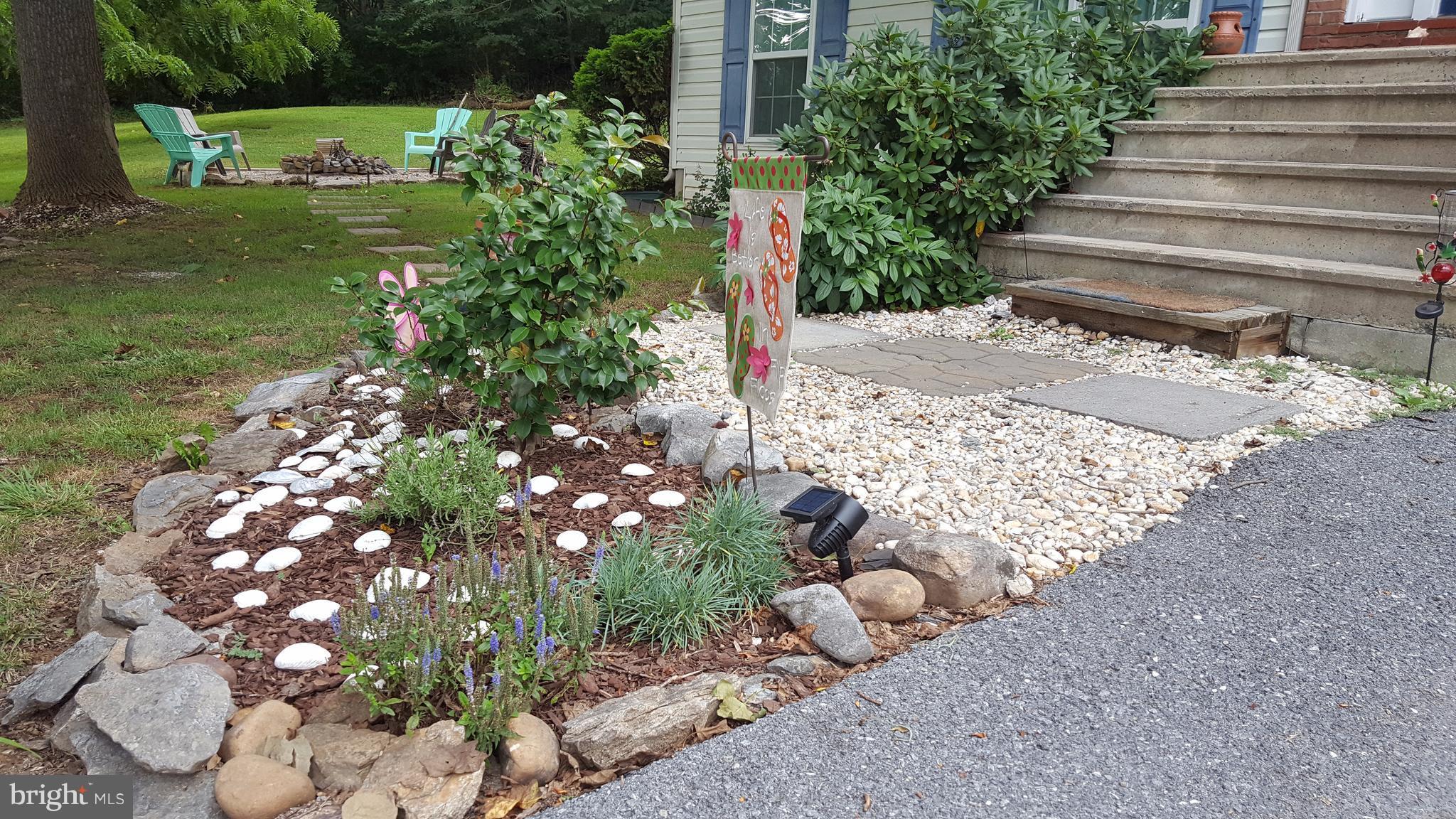 3182 Vineyard Road Falling Waters, WV 25419 - Photo 2 of 29 Neatly landscaped front entrance
