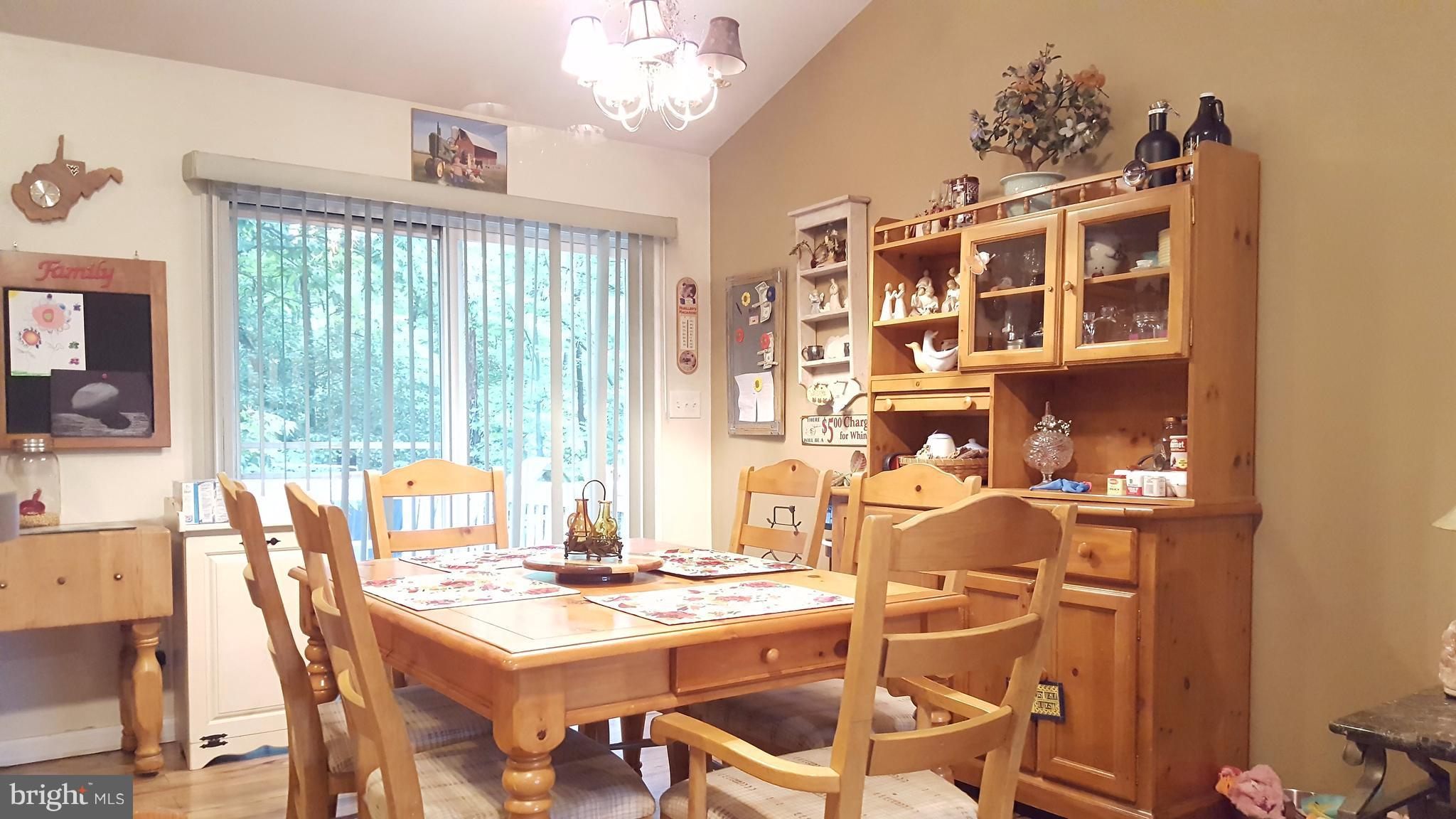 3182 Vineyard Road Falling Waters, WV 25419 - Photo 13 of 29 Dining area with walk out deck