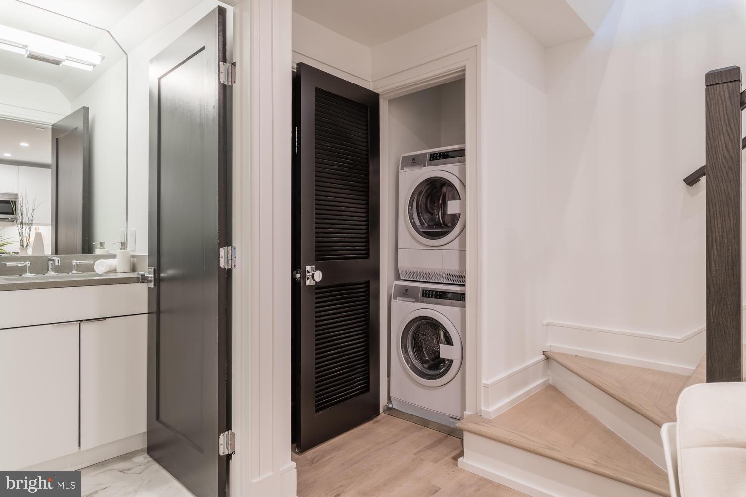 1524 18th Street Northwest, Unit 1 Washington, DC 20036 - Photo 20 of 20 a view of a kitchen with washer and dryer