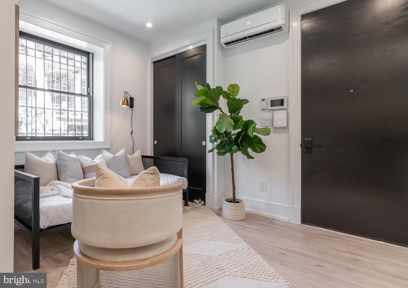 1524 18th Street Northwest, Unit 1 Washington, DC 20036 - Photo 4 of 20 a white bath tub sitting in a bathroom