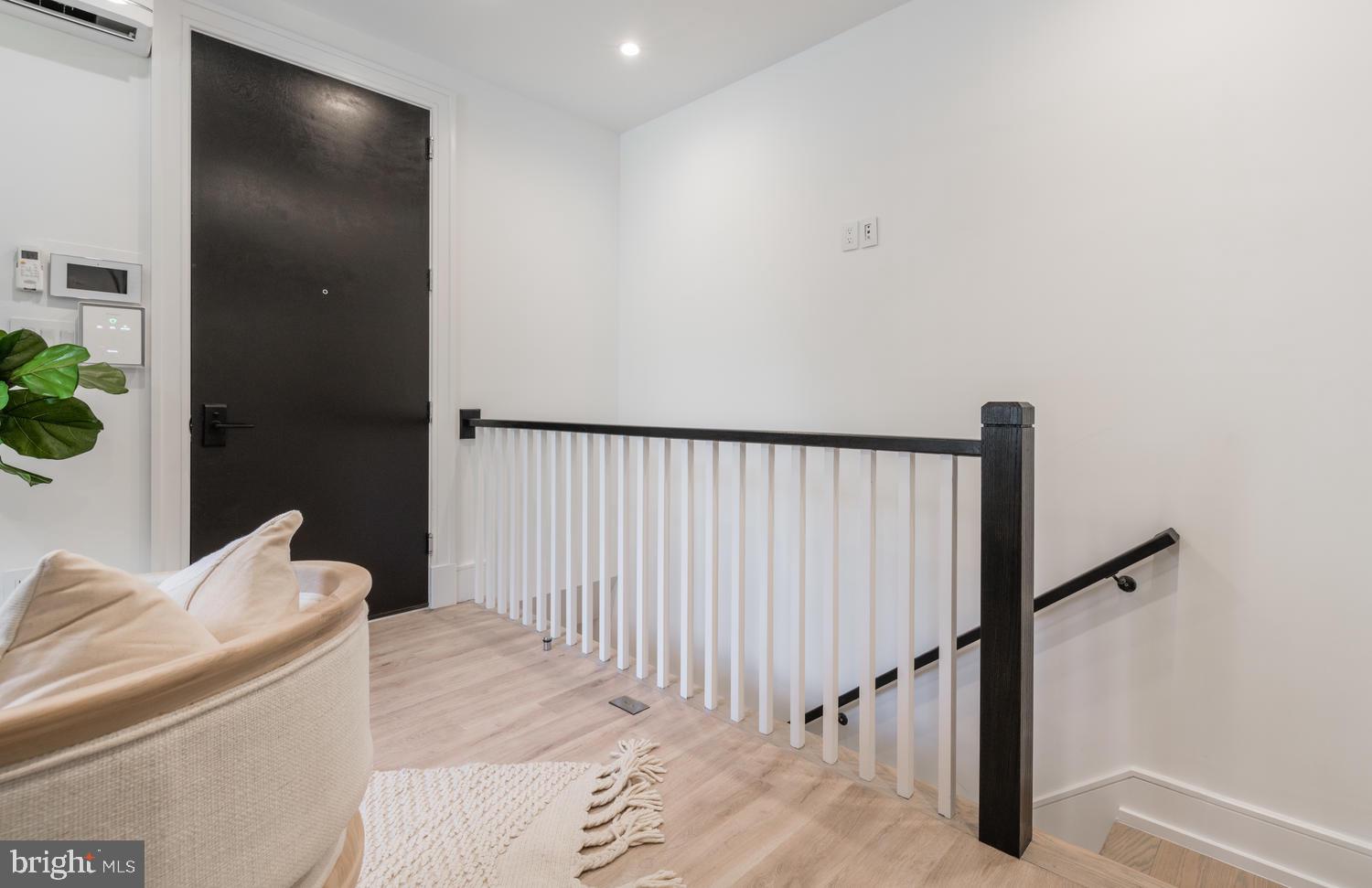 1524 18th Street Northwest, Unit 1 Washington, DC 20036 - Photo 7 of 20 a view of a hallway with a couch