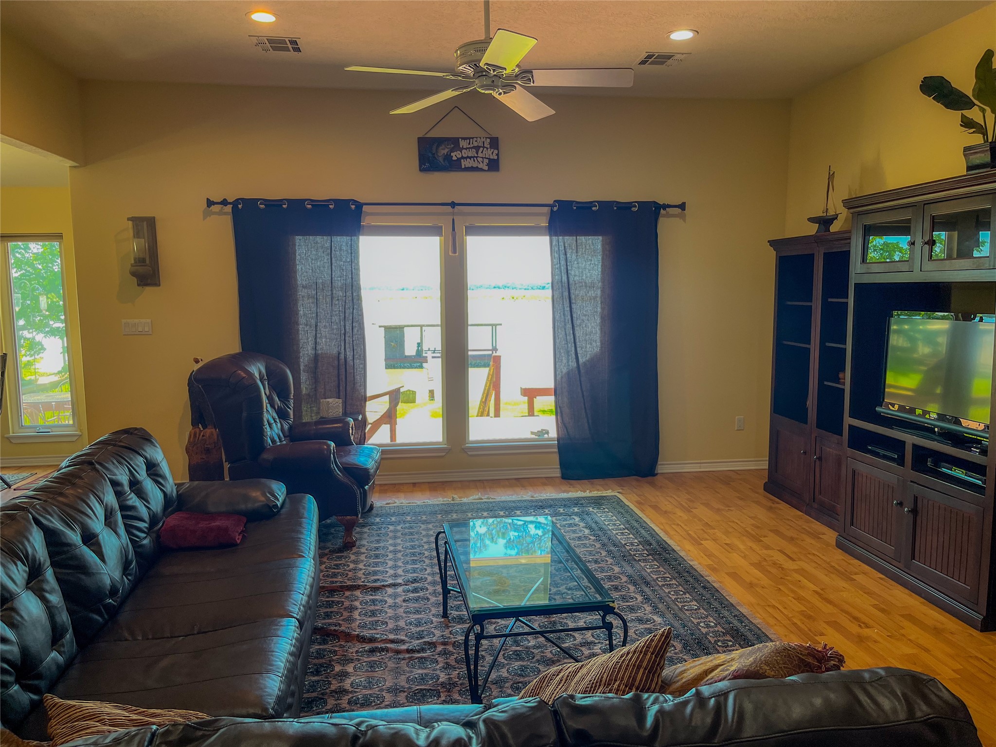231 Memphis Belle Trinity, TX 75862 - Photo 23 of 47 a living room with furniture and a flat screen tv