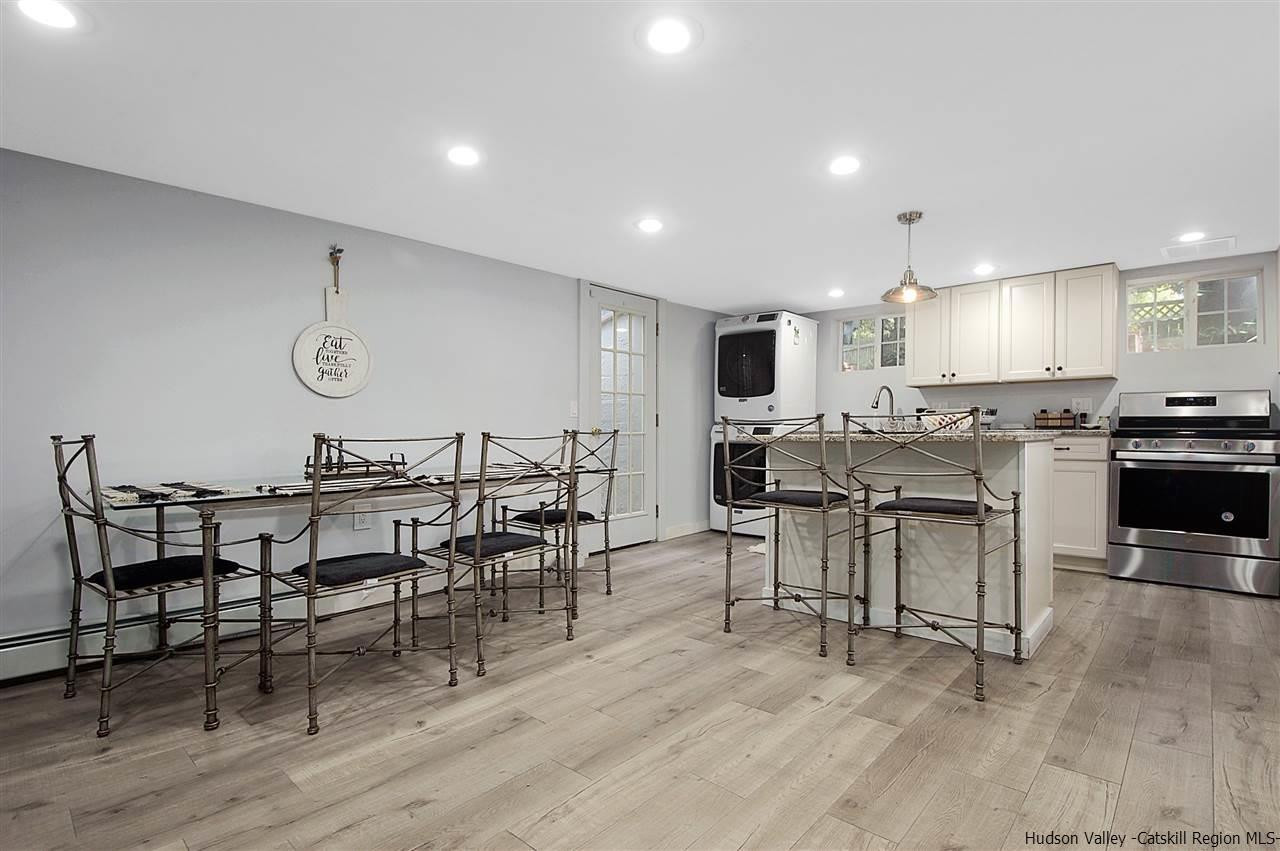 8 Jansen Road Stone Ridge, NY 12484 - Photo 11 of 28 a view of kitchen with cabinets table and chairs