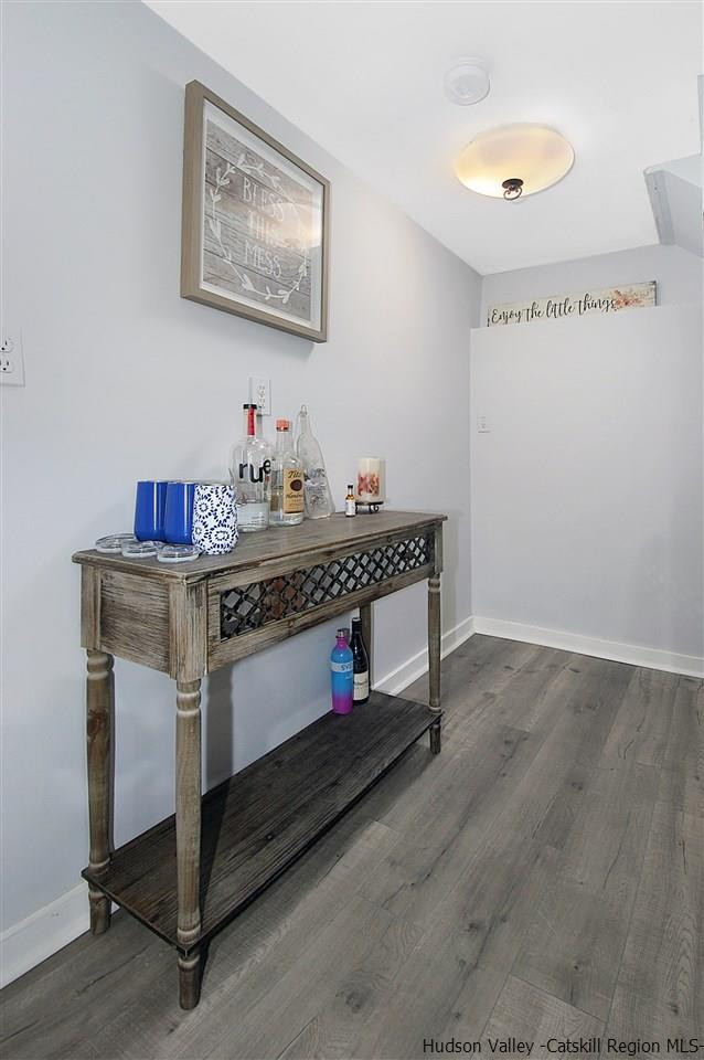 8 Jansen Road Stone Ridge, NY 12484 - Photo 12 of 28 a room with furniture and a chandelier