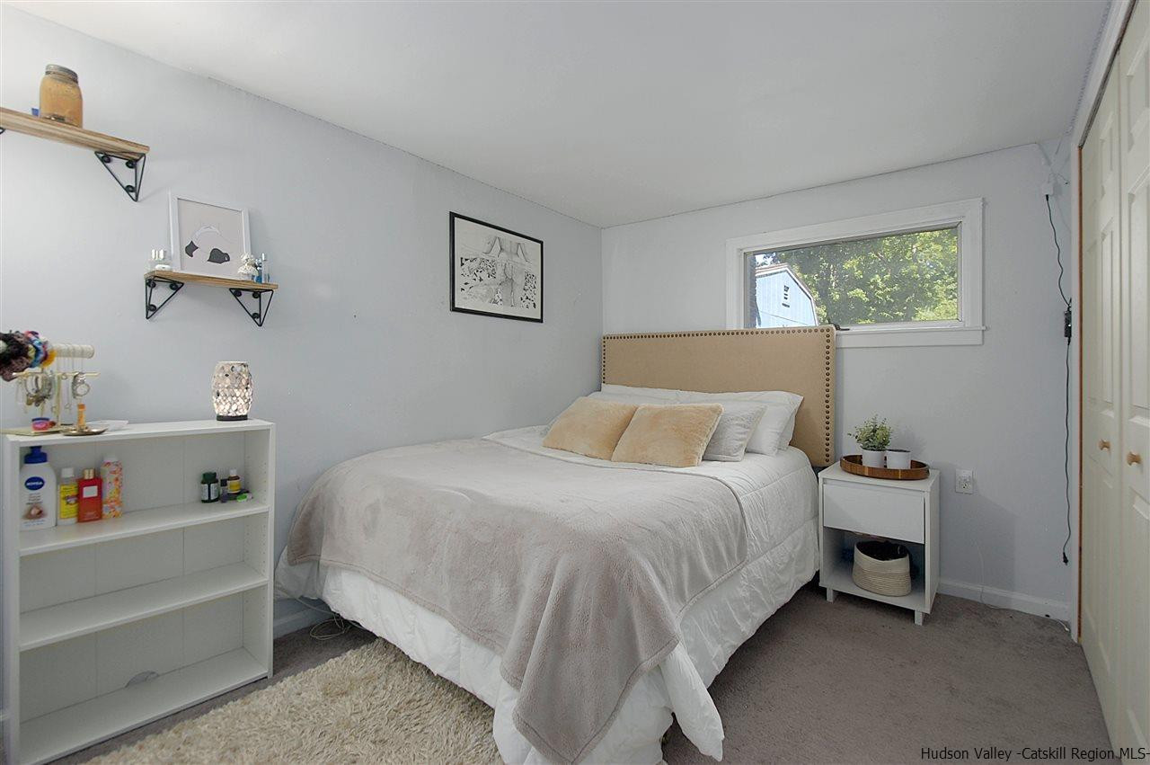 8 Jansen Road Stone Ridge, NY 12484 - Photo 14 of 28 a bedroom with a bed and a window
