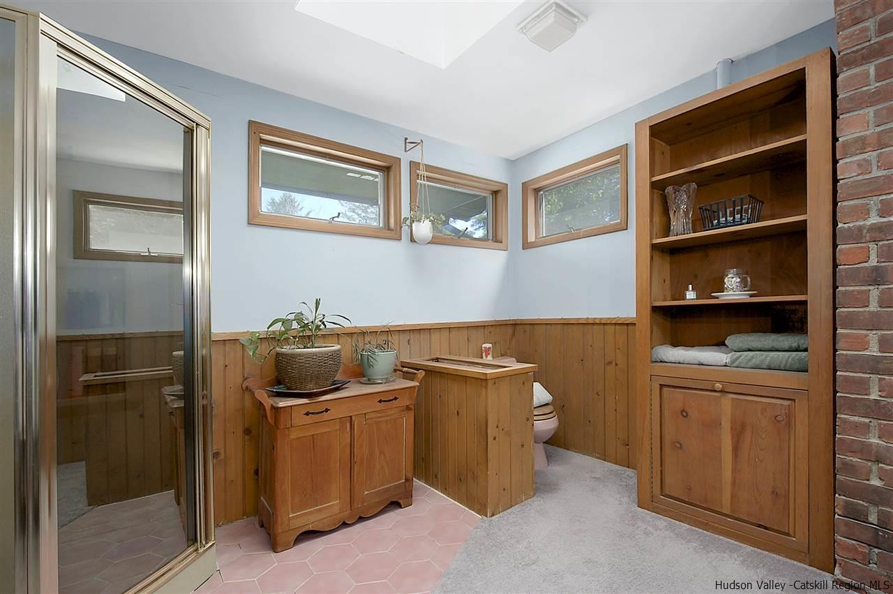 8 Jansen Road Stone Ridge, NY 12484 - Photo 19 of 28 a room with a cabinets and washer