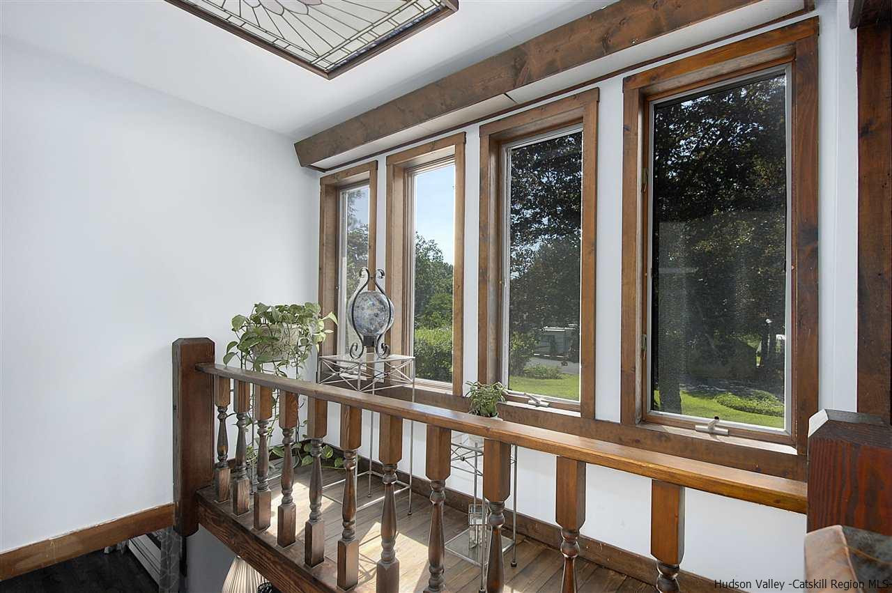 8 Jansen Road Stone Ridge, NY 12484 - Photo 22 of 28 a view of a porch with furniture