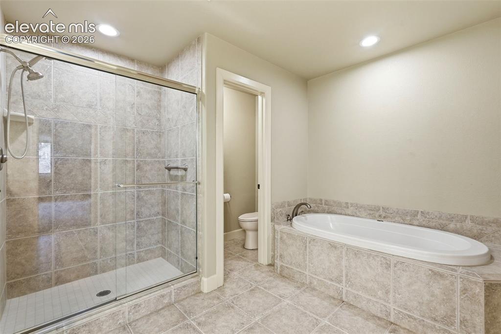 996 Summer Spring View Colorado Springs, CO 80906 - Photo 38 of 50 Downstairs Primary Bathroom