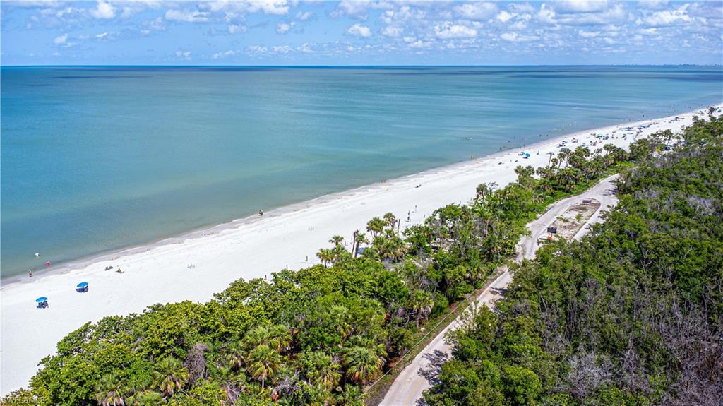 21 Bluebill Avenue, Unit 902 Naples, FL 34108 - Photo 6 of 44 Aerial view featuring a view of Delnor Wiggins beach