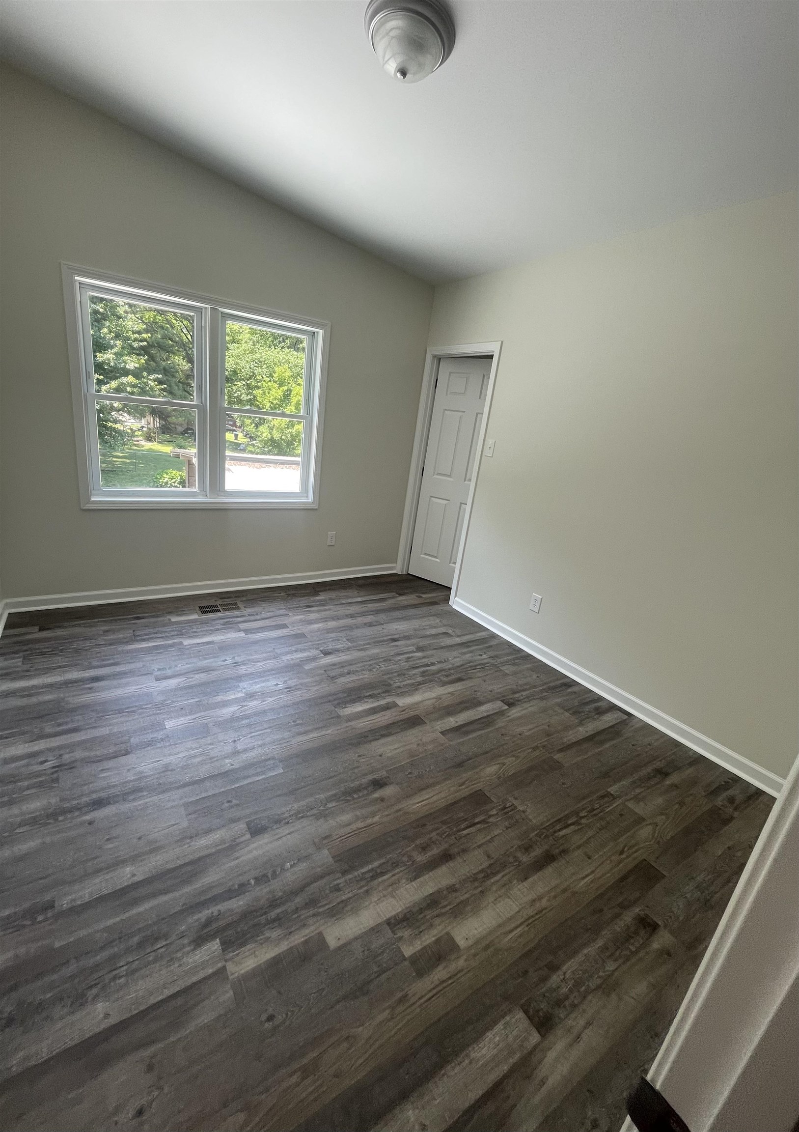 815 Fawn Road Oakland, TN 38060 - Photo 17 of 29 Master Bedroom featuring dark wood-type flooring and baseboards