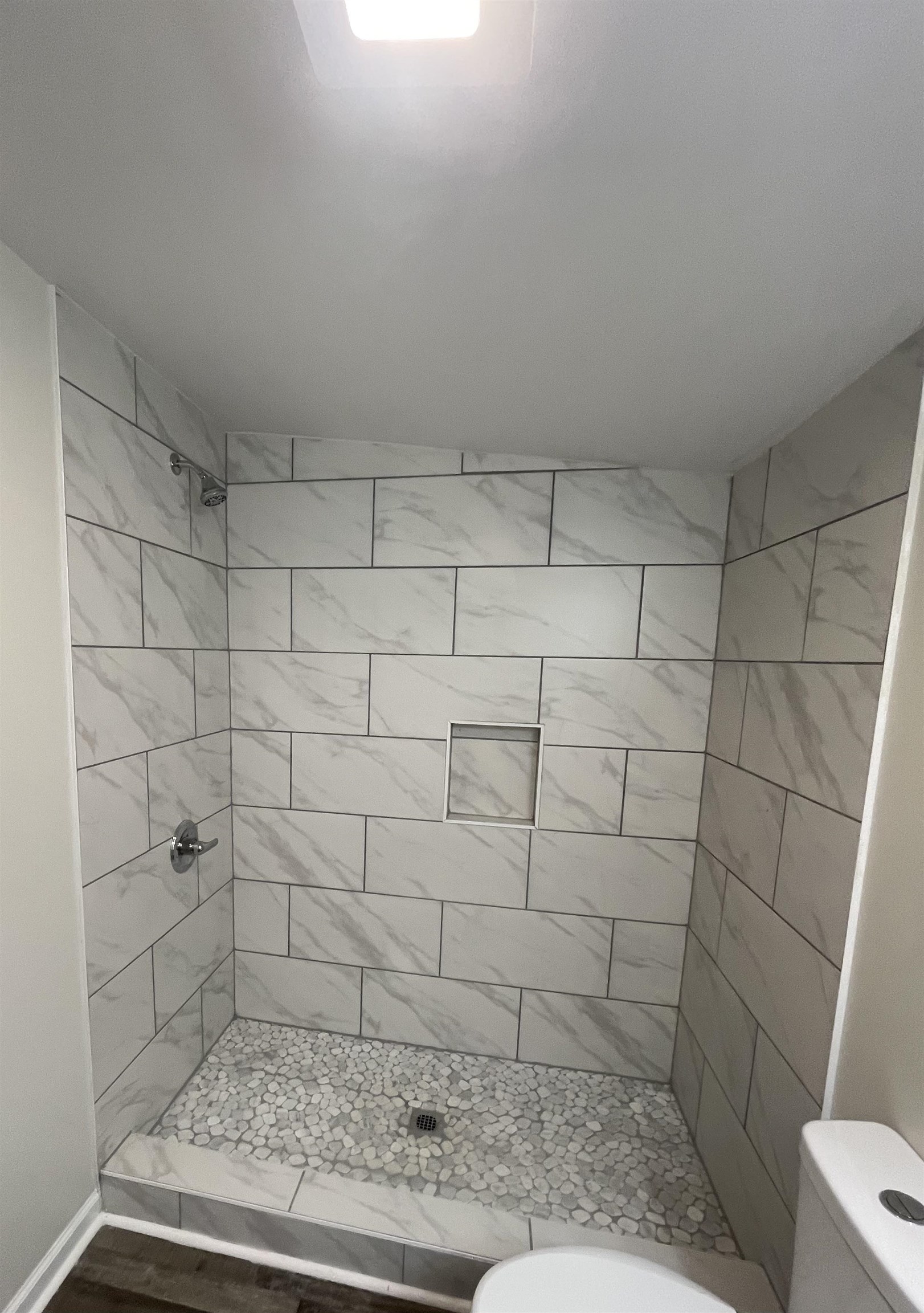 815 Fawn Road Oakland, TN 38060 - Photo 19 of 29 Full bathroom featuring toilet and tiled shower