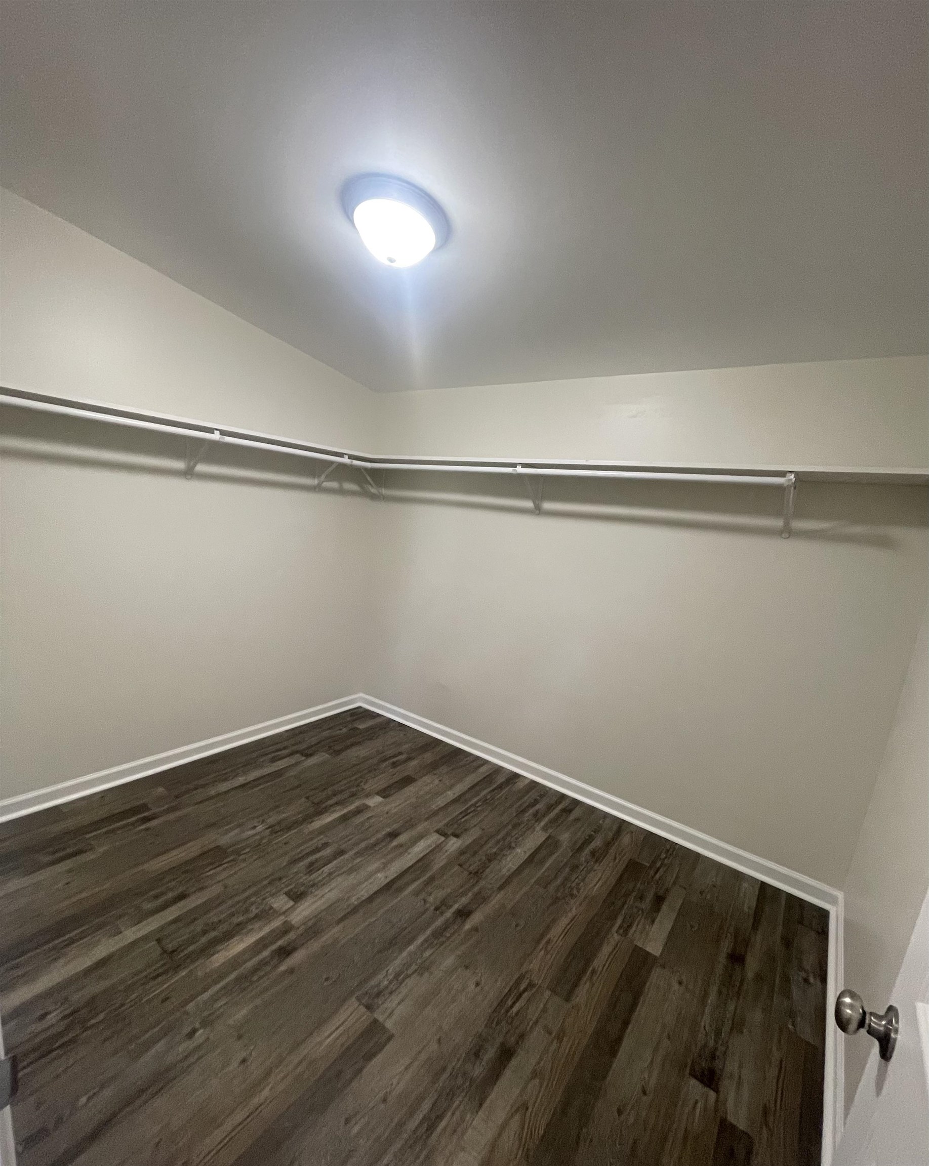 815 Fawn Road Oakland, TN 38060 - Photo 22 of 29 Spacious closet featuring dark wood finished floors