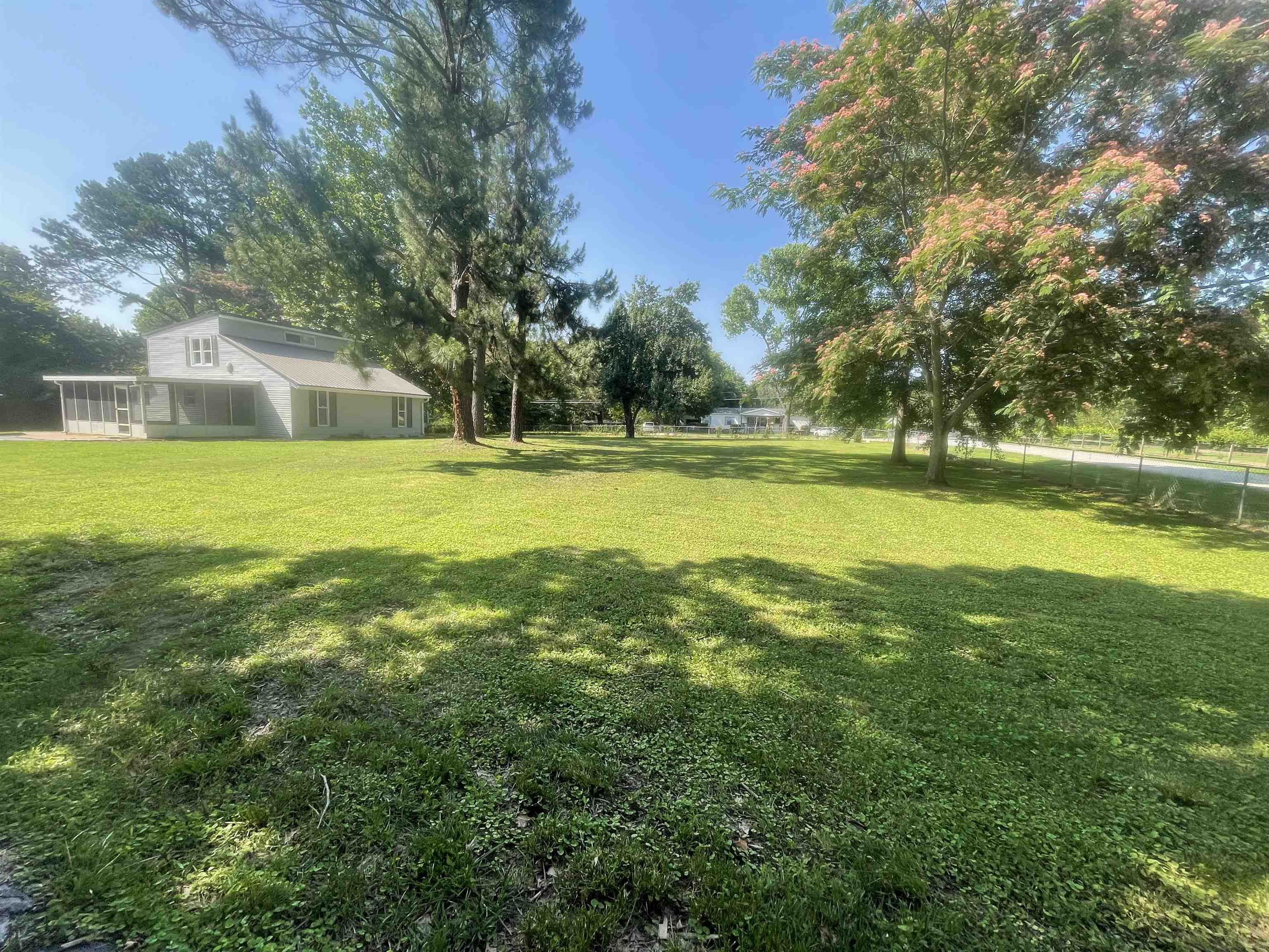 815 Fawn Road Oakland, TN 38060 - Photo 6 of 29 View of grassy yard with a sunroom