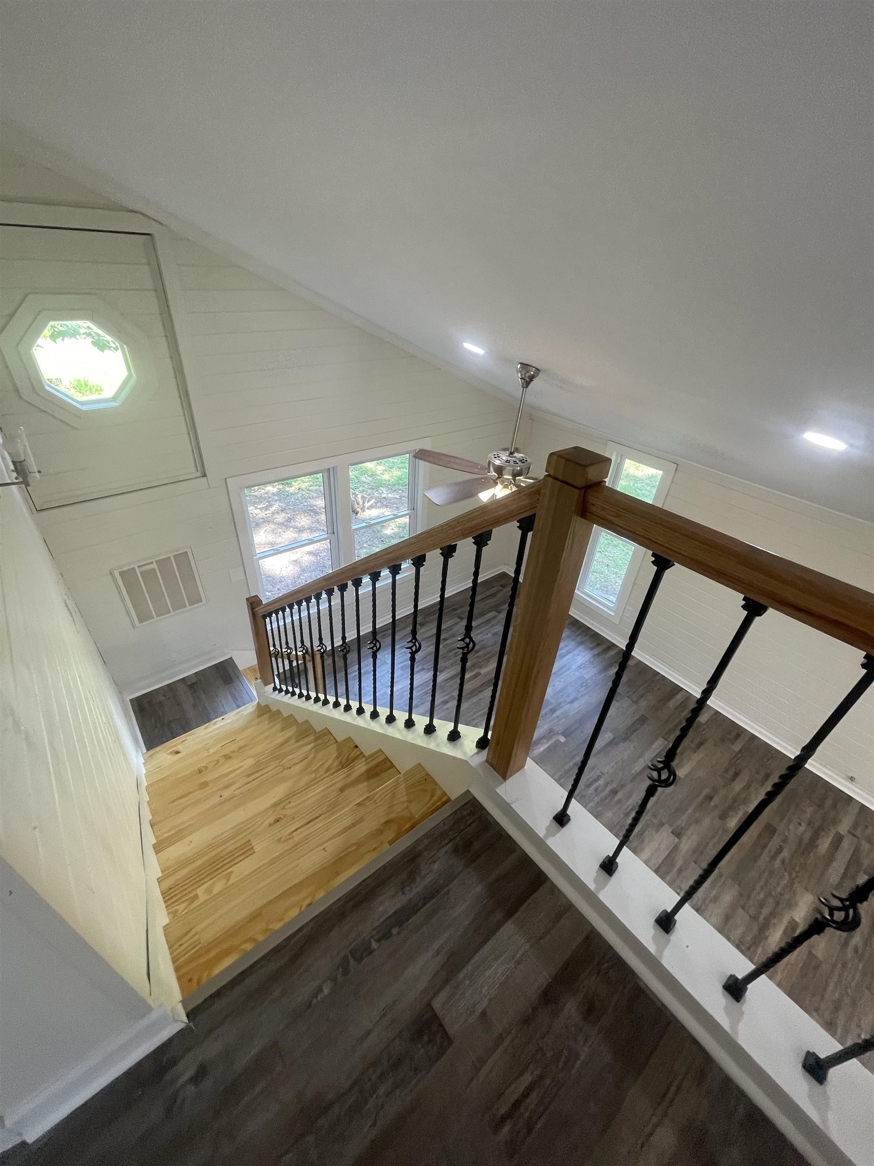 815 Fawn Road Oakland, TN 38060 - Photo 10 of 29 Staircase featuring wood finished floors, vaulted ceiling, and ceiling fan