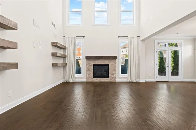 a view of a hallway with entryway door