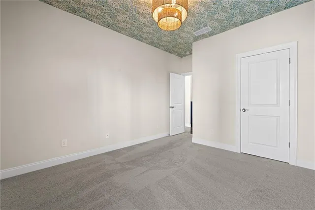 an aerial view of a house with swimming pool