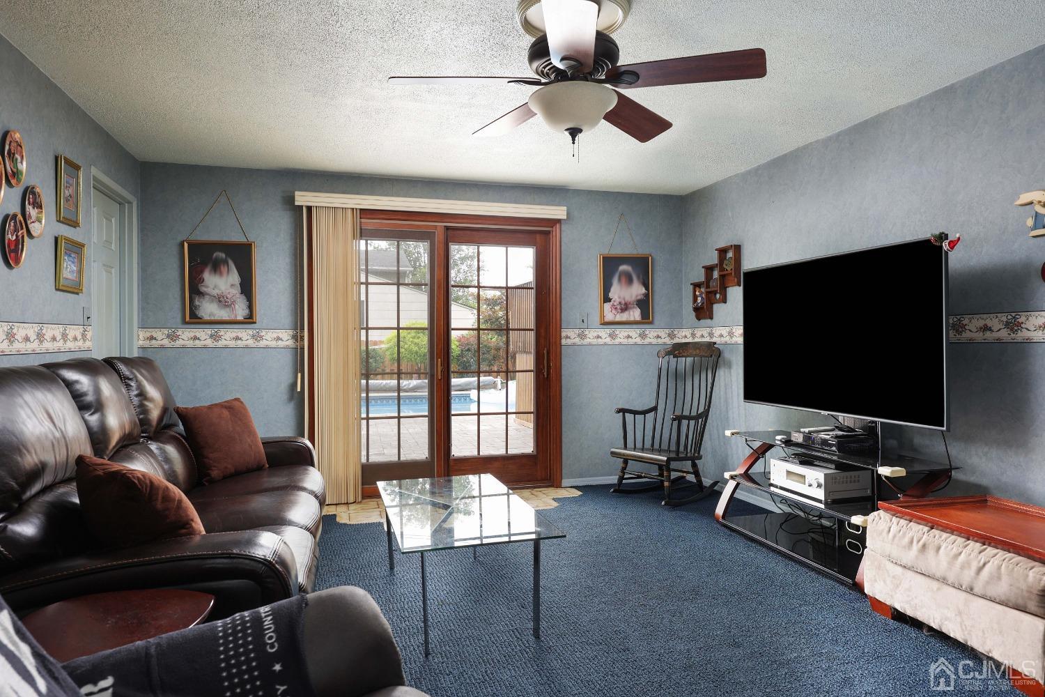10 Gramercy Road Old Bridge, NJ 08857 - Photo 11 of 31 a living room with furniture and a flat screen tv