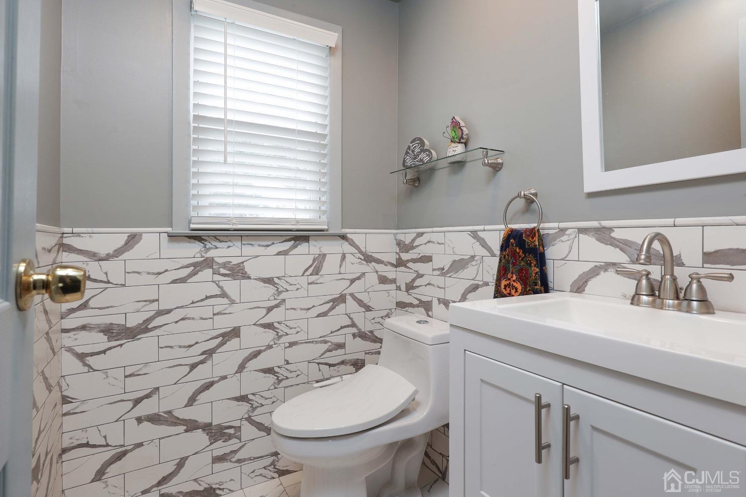 10 Gramercy Road Old Bridge, NJ 08857 - Photo 12 of 31 a bathroom with a sink and a toilet