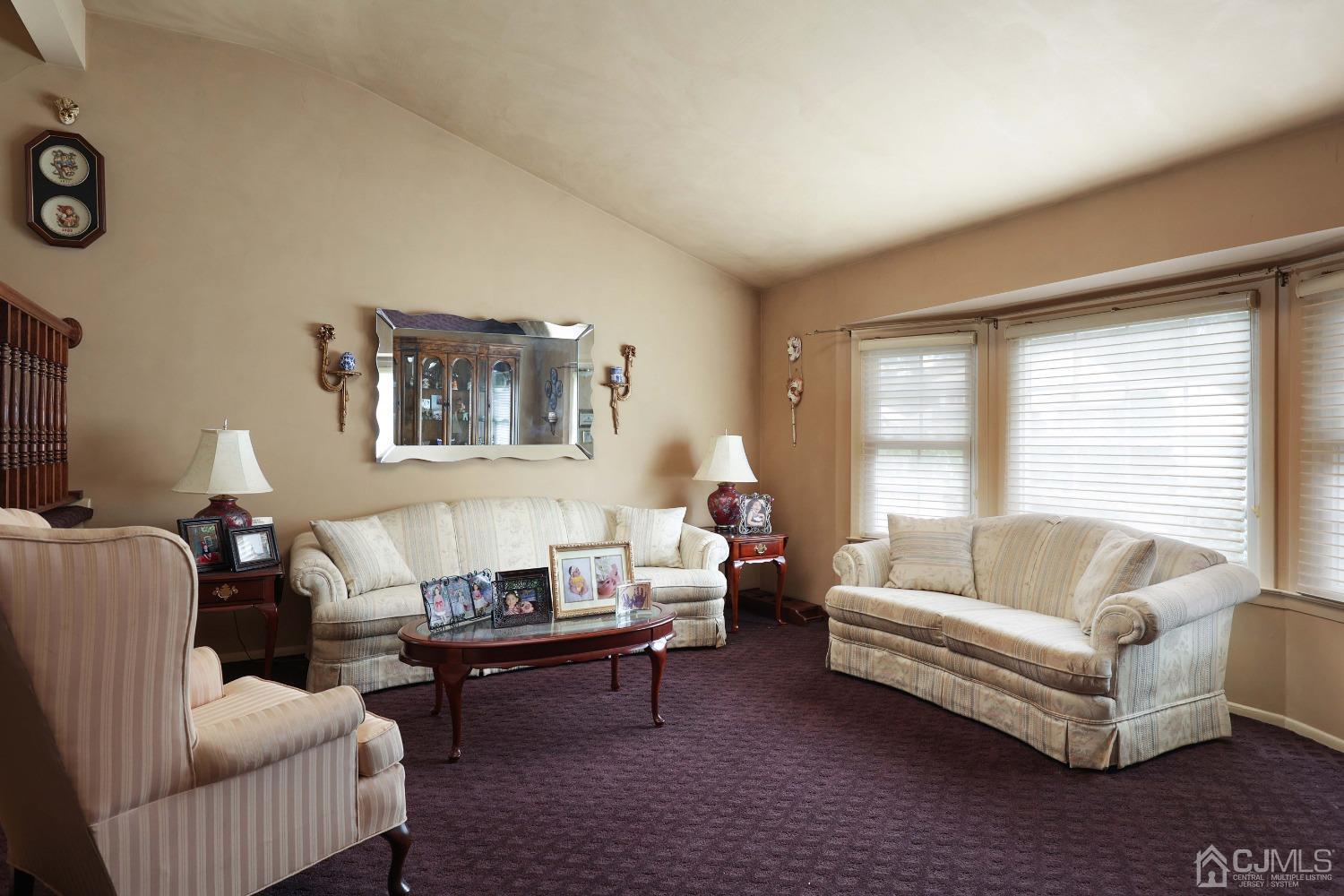 10 Gramercy Road Old Bridge, NJ 08857 - Photo 15 of 31 a living room with furniture and a large window