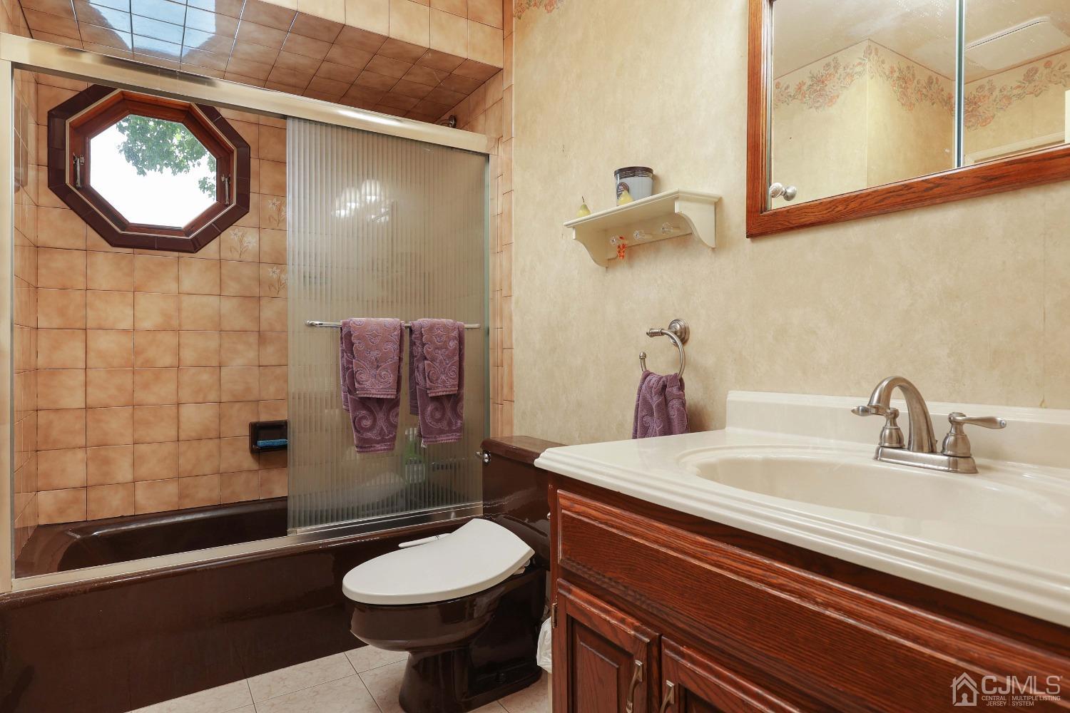 10 Gramercy Road Old Bridge, NJ 08857 - Photo 23 of 31 a bathroom with a sink a toilet and shower