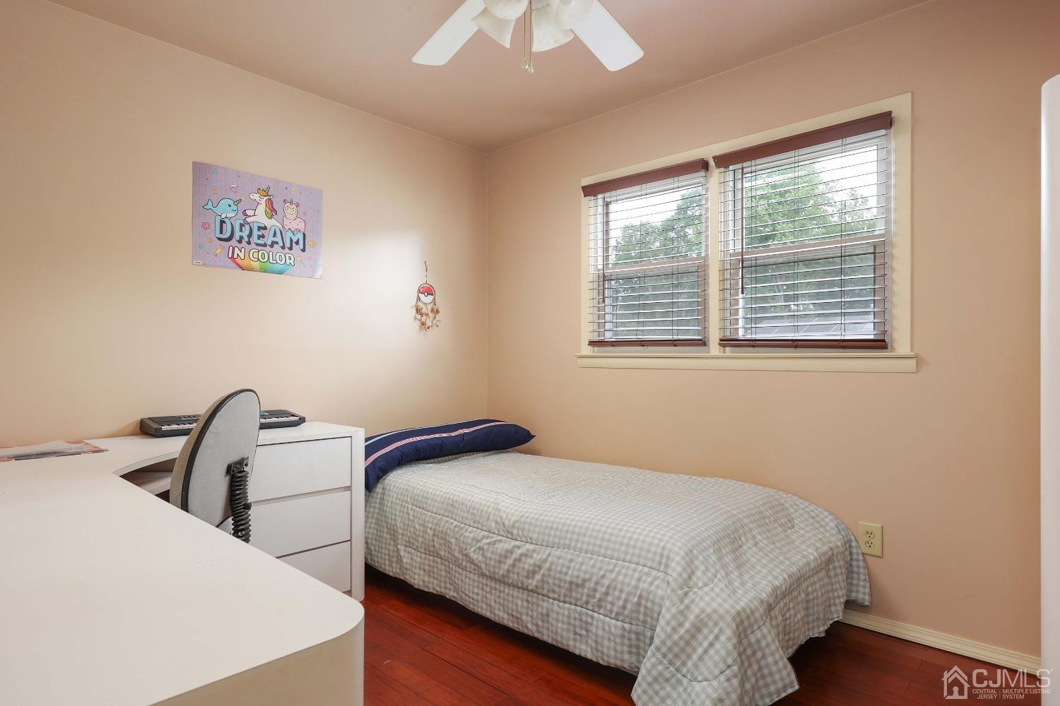 10 Gramercy Road Old Bridge, NJ 08857 - Photo 26 of 31 a bedroom with a bed and a large window