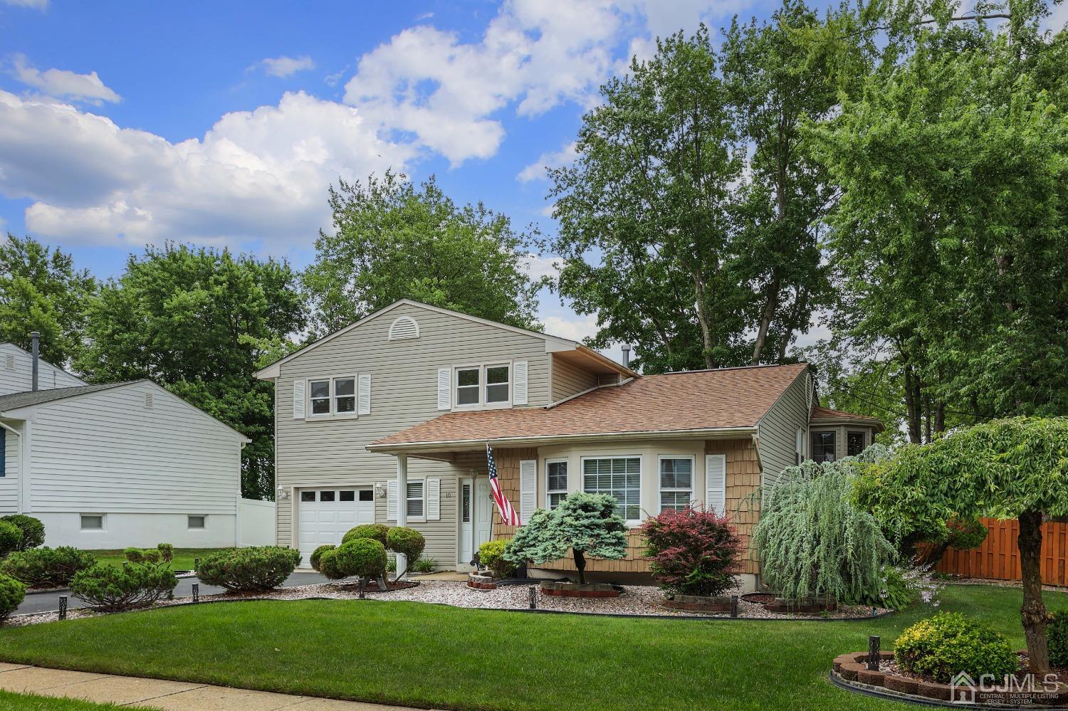 10 Gramercy Road Old Bridge, NJ 08857 - Photo 3 of 31 a front view of a house with garden