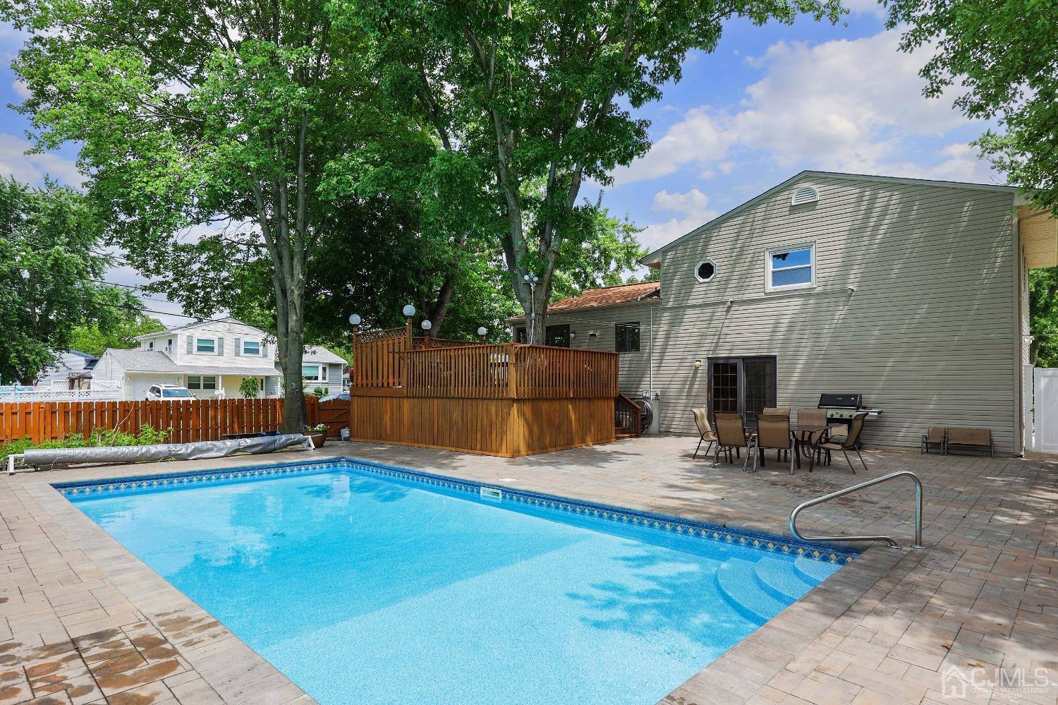 10 Gramercy Road Old Bridge, NJ 08857 - Photo 7 of 31 a house view with swimming pool and sitting space